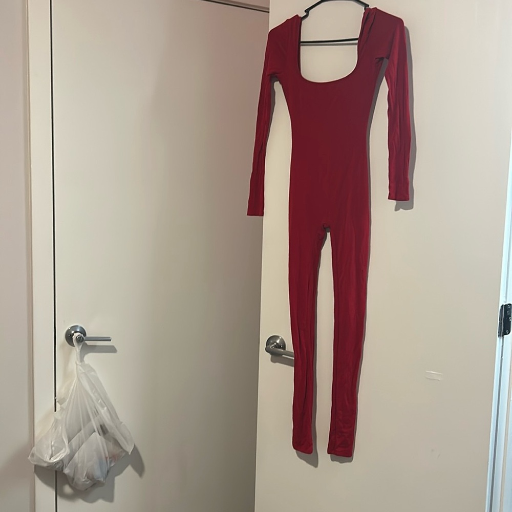 all red back out jumper/bodysuit